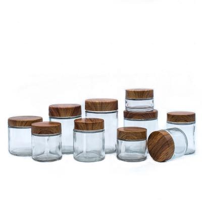 China Empty Multi-Specification Clear Glass Food Jar With Transfer Printing Cover Kitchen Food Jar Storage Glass Packing With Metal Lid for sale