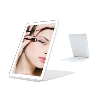 China Wireless LED Folding Cosmetic Travel Mirror Lighted Makeup Mirror with 3 Colors Light USB Charging or Battery Operated Cosmetic Mirror for sale