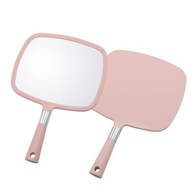 China Large Modern Professional Handheld Magnifying Mirror Girls Makeup Mirror for sale