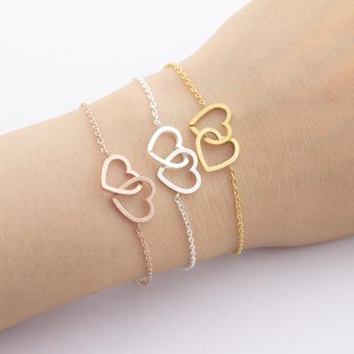 China TRENDY 18K Gold Plated Fashion Double Heart Charm Stainless Steel Bracelet For Women for sale