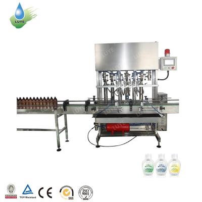 China CE Certificate Automatic Spray Oill Lotion Cream Filling And Capping Machine for sale