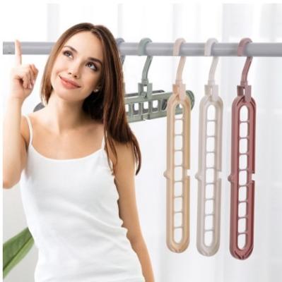 China Wholesale 9 Holes Eco - Friendly Drying Foldable Plastic Multifunctional Rack Hanger for sale