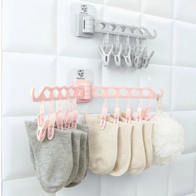 China Eco-friendly Home Travel Portable Perforated Free Standing Hanging Drying Rack Foldable Drying Clothes Rack Bathroom Socks Storage Rack for sale