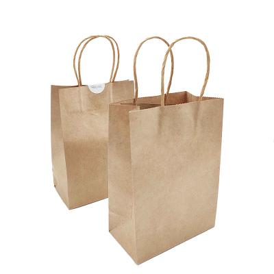 China Recycled Materials Recycled Kraft Paper Handle Bag Reusable Shopping Paper Bags for sale