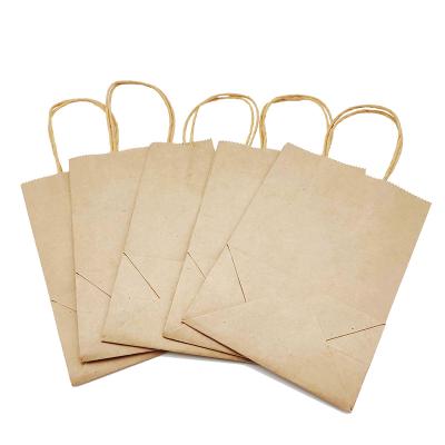 China Recycled Materials Brown Recycled Kraft Paper Bag With Twisted Handle Reusable Shopping Paper Bags for sale