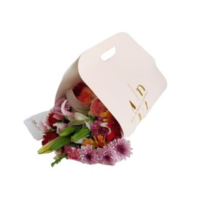 China Recyclable Custom Made Logo Hand-tied Flower Bouquet Carrier, Blush Flower Carrier Bag L006 for sale