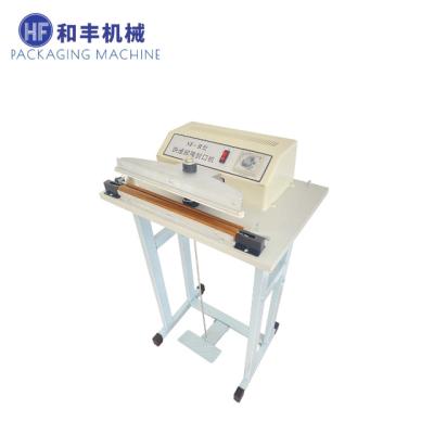 China HF-300 Food Plastic Bag Foot Pedal Sealing Machine Powered Switch Type Cutter Sealer Semi-automatic Food Sealing Machine for sale