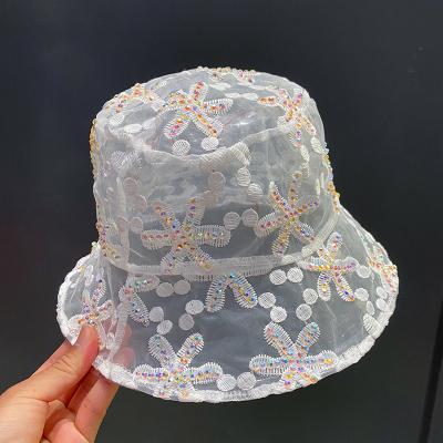 China New character water drill pearl lace spring mesh ventilation sunscreen hat fisherman hat in summer 2021 female gutters basin hat small for sale