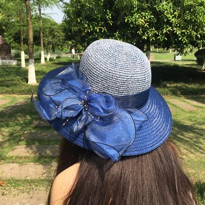 China New Character Summer Women's Organza Hat Summer Outdoor Sunscreen Large Brim Sunshade Bow Straw Hat Mesh for sale