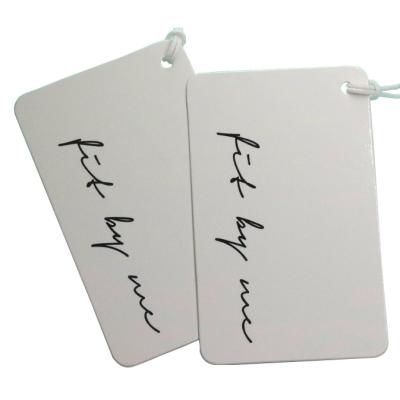 China Durable Matt Cardboard Hang Tag Garment Accessories Clothing Paper Tag With Embossed Hangtags For Clothing for sale