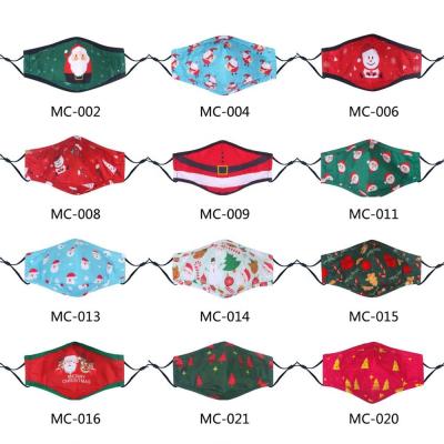 China Low MOQ Custom LOGO Reusable 3 Ply Dust Proof Cotton Cartoon Printed Adult Face Maskes Christmas Party Reusable Maskes for sale