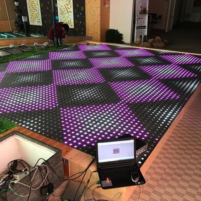 China Hotels Wireless Diy Dance Disco DJ Lights Pista De Color Changing Light Up Dmx RGB Video Led Digital Dance Floor Black Tarpaulin Board for sale