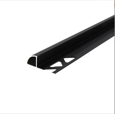 China Modern Aluminum Skirting Board Wood Color Aluminum Profile Angle Skirting Kicking Foot Line for sale