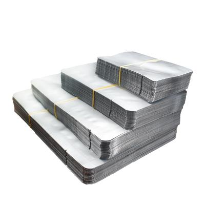 China Moisture Proof Printed 3 Sides Sealed Silver Aluminum Foil Vacuum Mylar Bag Vacuum Bag Sealer for sale