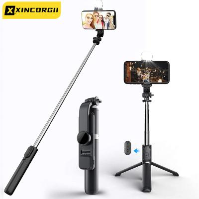 China 2021 New Arrival 40 Inch Portable Lightweight Extendable Tripod Adjustable Phone Wireless Remote Selfie Stick With LED Light for sale