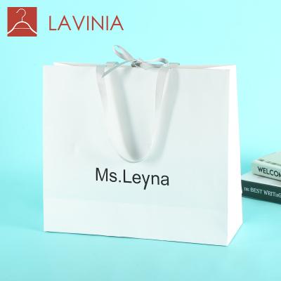 China Recyclable Wholesale Cheap Recyclable Log Clothing Tote Bag Tote Gift Bag Custom Paper Bag Handle for sale