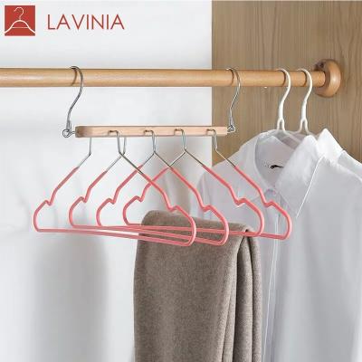 China Eco-friendly magic hanger four layer multifunctional clothes and pants rack beech pvc coated telescopic meteal hanger for sale