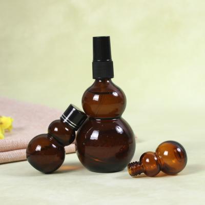 China Personal Care NJ New Design Custom Squash 100ml Like Empty Amber Glass Essential Oil Bottle With Dropper for sale