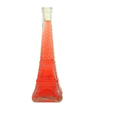 China Wholesale 200ml 375ml Beverage Eiffel Tower Shaped Clear Glass Juice Bottles For Beverage for sale