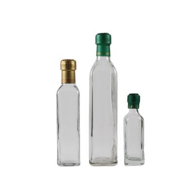 China 2021 Viable Ready To Ship 250ml 500ml 1000ml Clear Square Olive Oil Bottle Spice Glass Bottles for sale