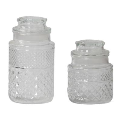 China 2021 Canned Food 900ml 1500ml Round Cut Out Cut Out Pattern Glass Storage Jar With Glass Cover For Food Storage for sale