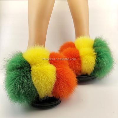 China Fashion Trend Designer Pvc Sole Eva Sole Fur Ball Fur Slides With Thick Fur for sale