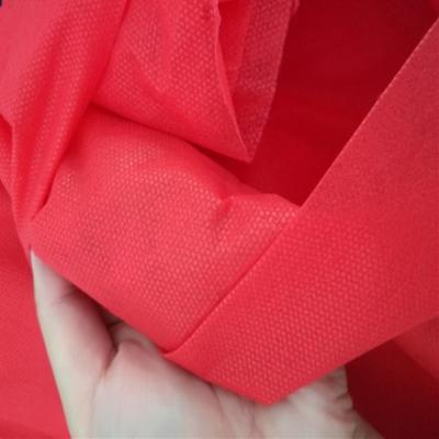 China Breathable Red 1000kg Factory Straight Nonwoven Fabric For Sale Per Ton for sale