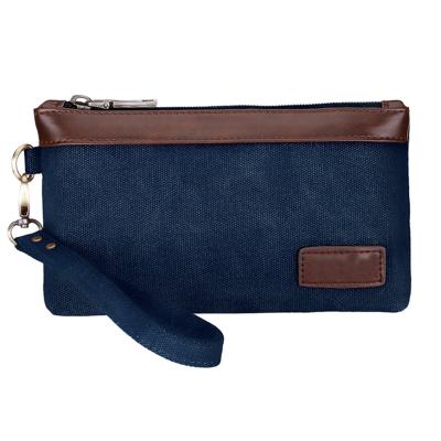 China Waterproof custom casual style leather and canvas lady material wallet with a wrist strap for sale