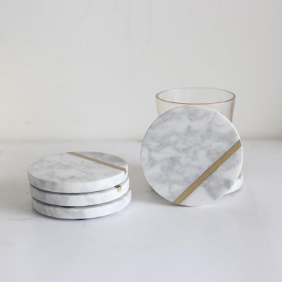 China Sustainable Crafts Set 4 Pcs White Cup Tea Stone Round Marble Coasters For Beverage With Brass for sale