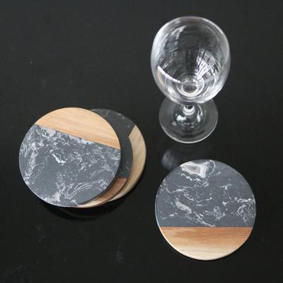 China LFGB Sustainable Testing Customized Round Black Marble And Wood Coaster For Kitchen for sale