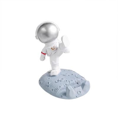 China Waterproof Top 2021 Selling Spot Astronaut Desktop Mobile Phone Holder Resin Furnishings Astronaut Tablet Bracket for sale