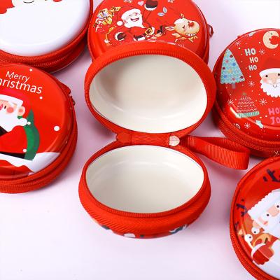 China Durable Christmas Storage Bag Children Kids Change Coin Purse Cartoon Print Wallet Cute Santa Claus Print Purses Pocket Round Bags for sale