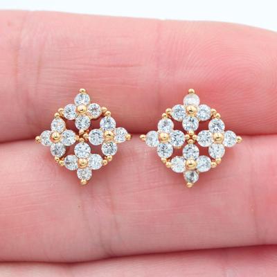 China TRENDY 18K Gold Plated Women Girls Shape Clear White CZ Cubic Zircon Flower Stud Earrings Jewelry for sale