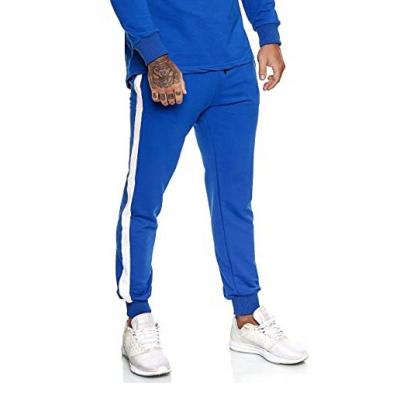 China Anti-wrinkle spring slim men's pants casual gym sweat sports pants men's elastic waist color men's sports tracksuit for sale