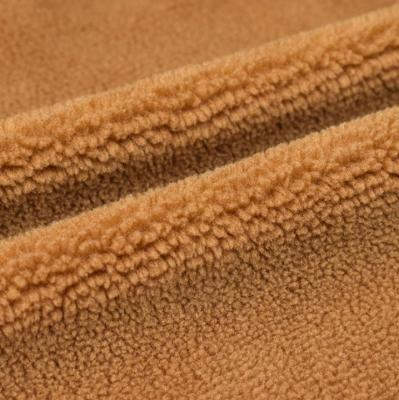 China Coral Sherpa Fleece Fabric For Polyester Waterproof Micro Bonded Fleece Covering Garment for sale