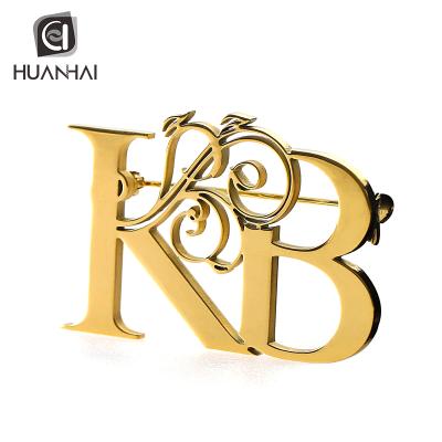 China Custom Die Cut Europe Metal Gold Plated Logo Die Casting Badge Pin for sale