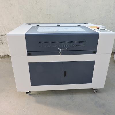 China Factory supply 90w CO2 w2 36 x 24 inches direct Reci Laser Cutter Engraver CUT and Cu laser at wholesale price for sale