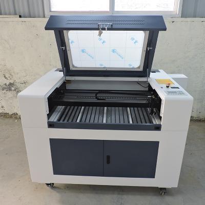 China Laser CUTTING Best Cheap Price Watch Glasses CO2 Laser Cutting Machine for sale