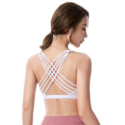 China Breathable Fitness Sports Bra For Women Push Up Wireless Padded Crisscross Strappy Running Tops Gym Training Workout Yoga Underwear Crop for sale