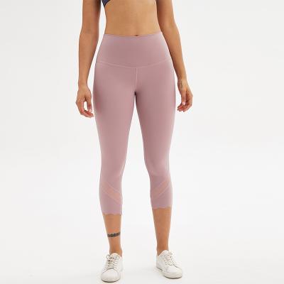 China Hot Selling QUICK DRY High Waist Yoga Pants Bulge Control Wave Cropped Leggings for sale