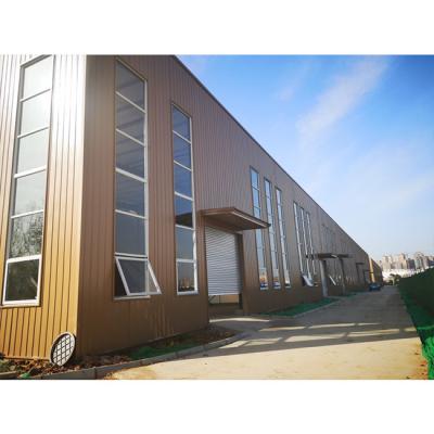 China Moderne glazen gordijnmuur Appartement Prefabricated House Metalen constructie magazijn opslag Lichte staal structuur Gebouw voor winkelcentrum Te koop