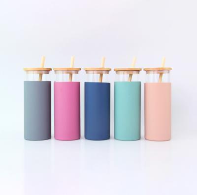 China Viable Amazon Hit Custom Bamboo Sleeve Silicone Glass Lid Tumblers For Drinking Water Bottle With Straw for sale