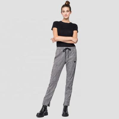 China Breathable women fashion houndstooth print drawstring pants with pocket zippers and invisible zippers on the leg bottom for sale