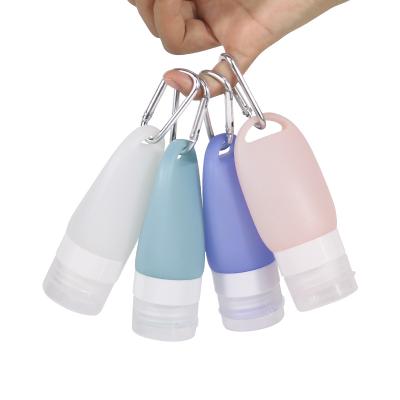 China Creative Perforated Household Products Silica Gel Bottles Portable And Hangable Four-in-One Bottled Silica Gel Travel Bottle Squeeze New for sale