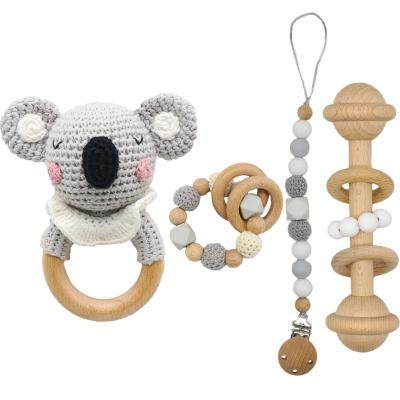 China Natural Eco-Friendly Durable Baby Training Teether Sensory Toys Set For Crocheting Teether Ring Baby Rattle Knitting Animal Wooden Toy Infant Pacifier Clips Chain for sale