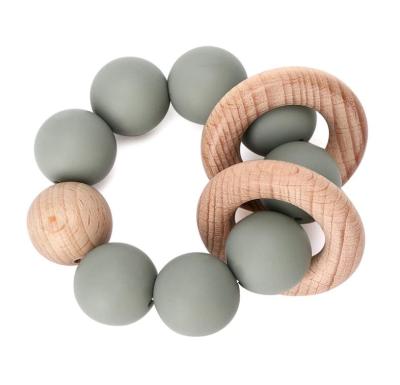 China Bracelet Rattle Silicone Bead Baby Teether Food Grade Newborn Mouth Explore Silicone and Wooden Baby Teether Baby Teething Ring Baby Teething Toy for sale