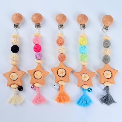 China BPA Free 2022 Newest Baby Stroller Hanging Toys Wooden Star Shape Teether Baby Pacifier Molar Chewable Clip Chain for sale