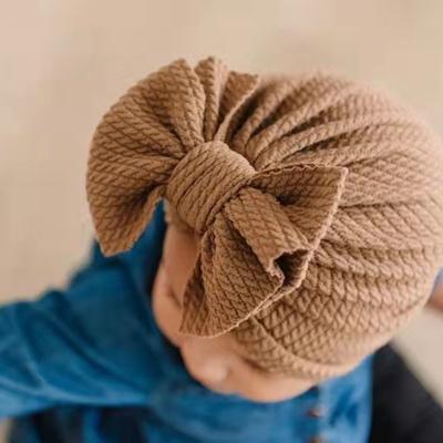 China Comfortable Soft Hair Accessories Large Autumn Baby Bow Headwrap Knit Indian Waffle Cloth Kids Hats Baby Turban Headband For Girls for sale