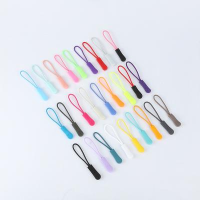 China Good Quality Silicone Zipper Puller Custom Made PVC Nickel Free Zipper Slider Rubber Head With Waxed String For Sports Clothes for sale