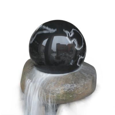 China Natural Solid Marble Stone Black Outdoor Garden Floating Ball Marble Water Fountain for sale